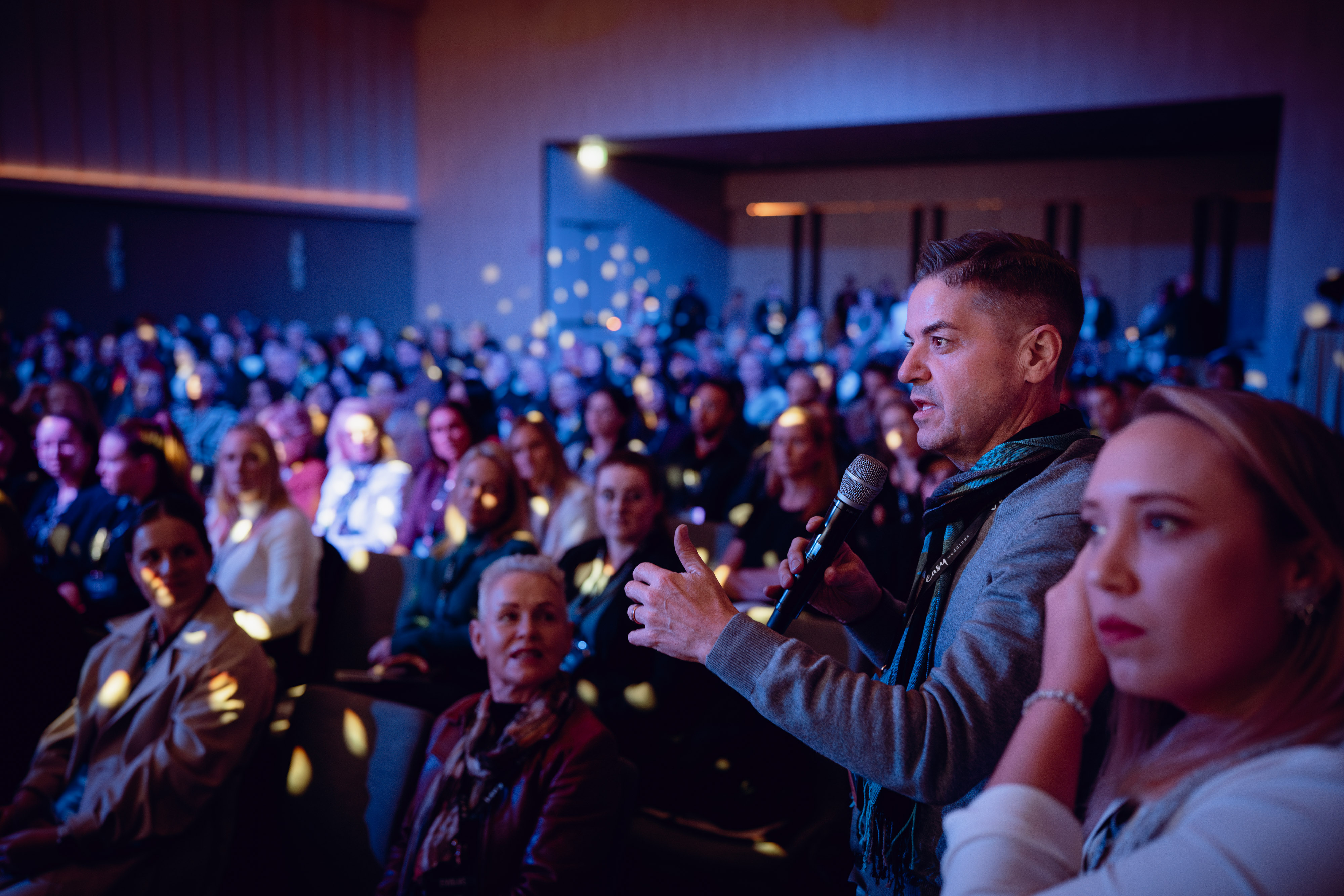 Audience member speaking at Evolve